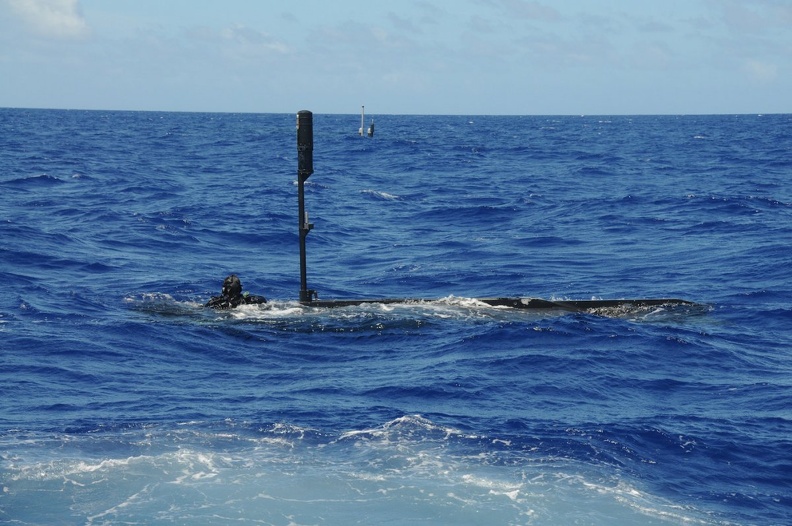Seal-delivery-team-1-surfacing-in-its-seal-delivery-vehicle-and-swimming-back-to-the-michigan-in-the-pacific-ocean-in-2012.jpg