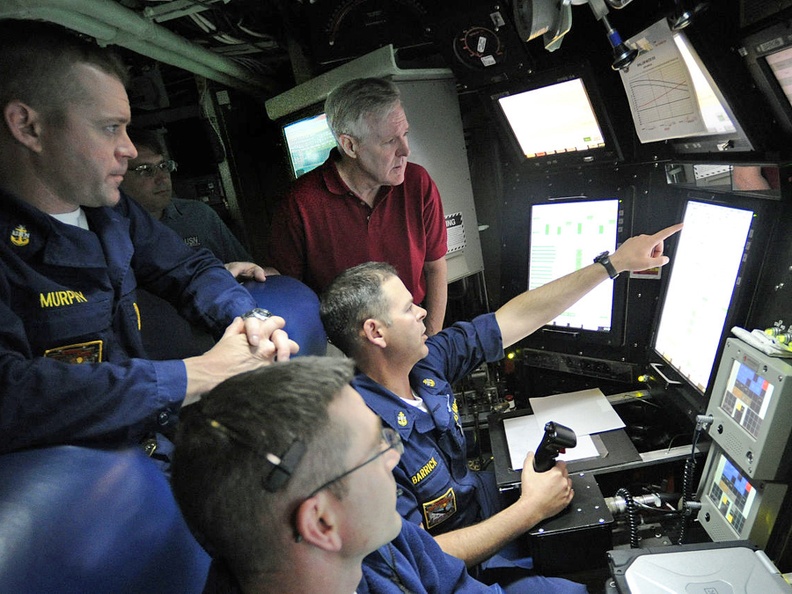 going-further-toward-the-bow-of-the-sub-the-command-center-is-directly-beneath-the-main-sail-of-the-sub-and-where-the-navigators-do-their-work.jpg
