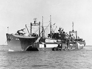 AS 25 USS Apollo loading supplies off New York, circa in late 1944 (19-N-73530)